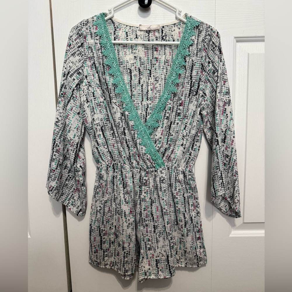 A3 Design Monochrome Romper with Pink and Teal Accents